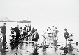 Children paddling at the beach