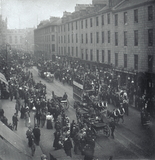 A parade of trams along Union Street