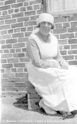 Outdoor portrait of a woman wearing a nurse's uniform