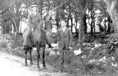 Portrait of two men, one on horseback.