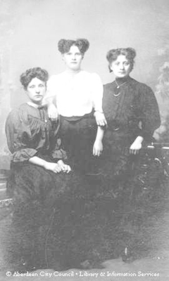 Portrait of three young ladies