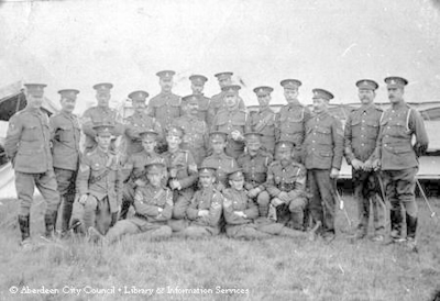 Group photograph of Officers outside tents. 1914