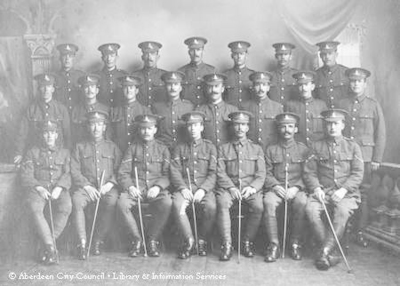 Seated portrait of army officers from the Highland Brigade. 1914